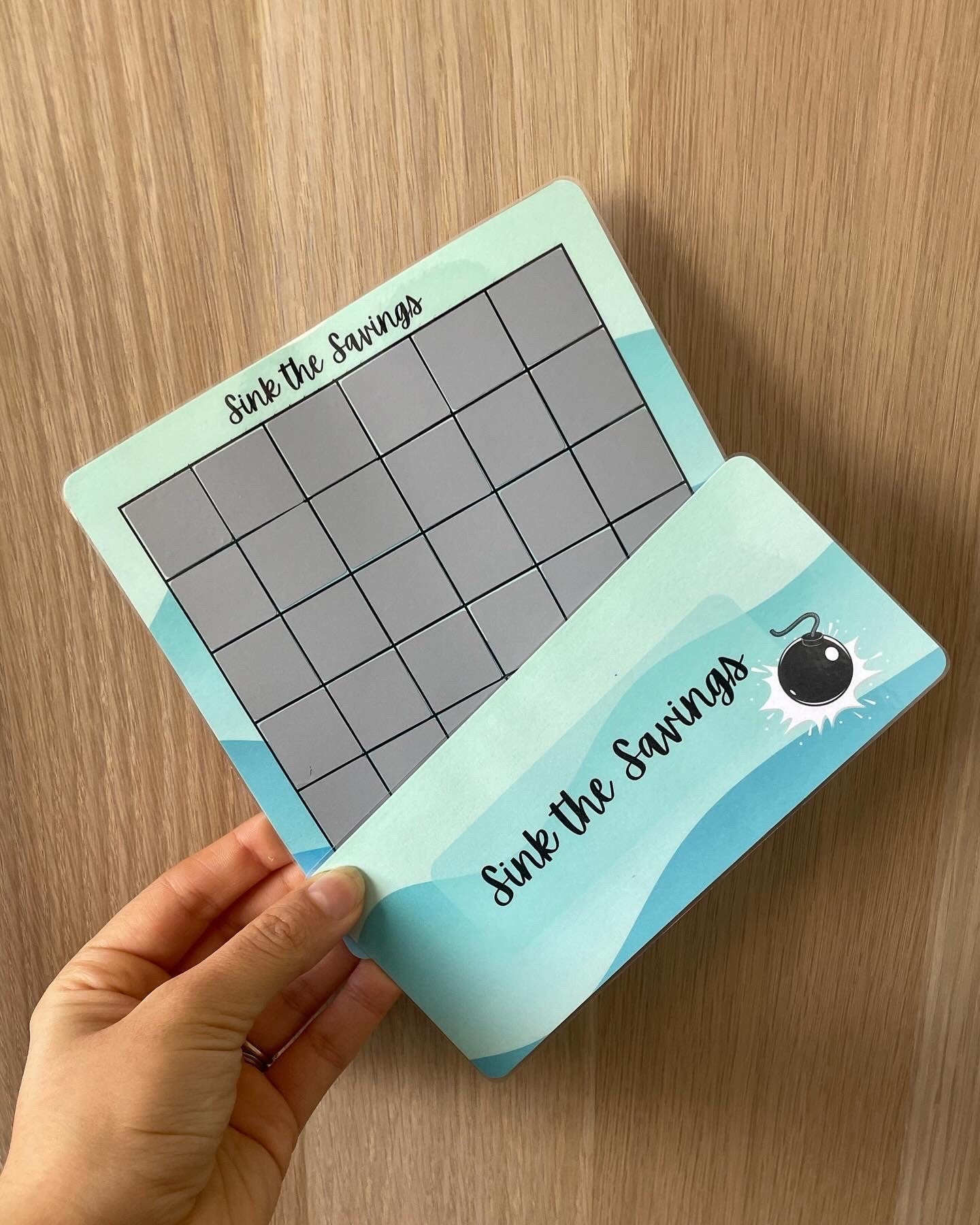 Sink Your Savings Scratch Off Game