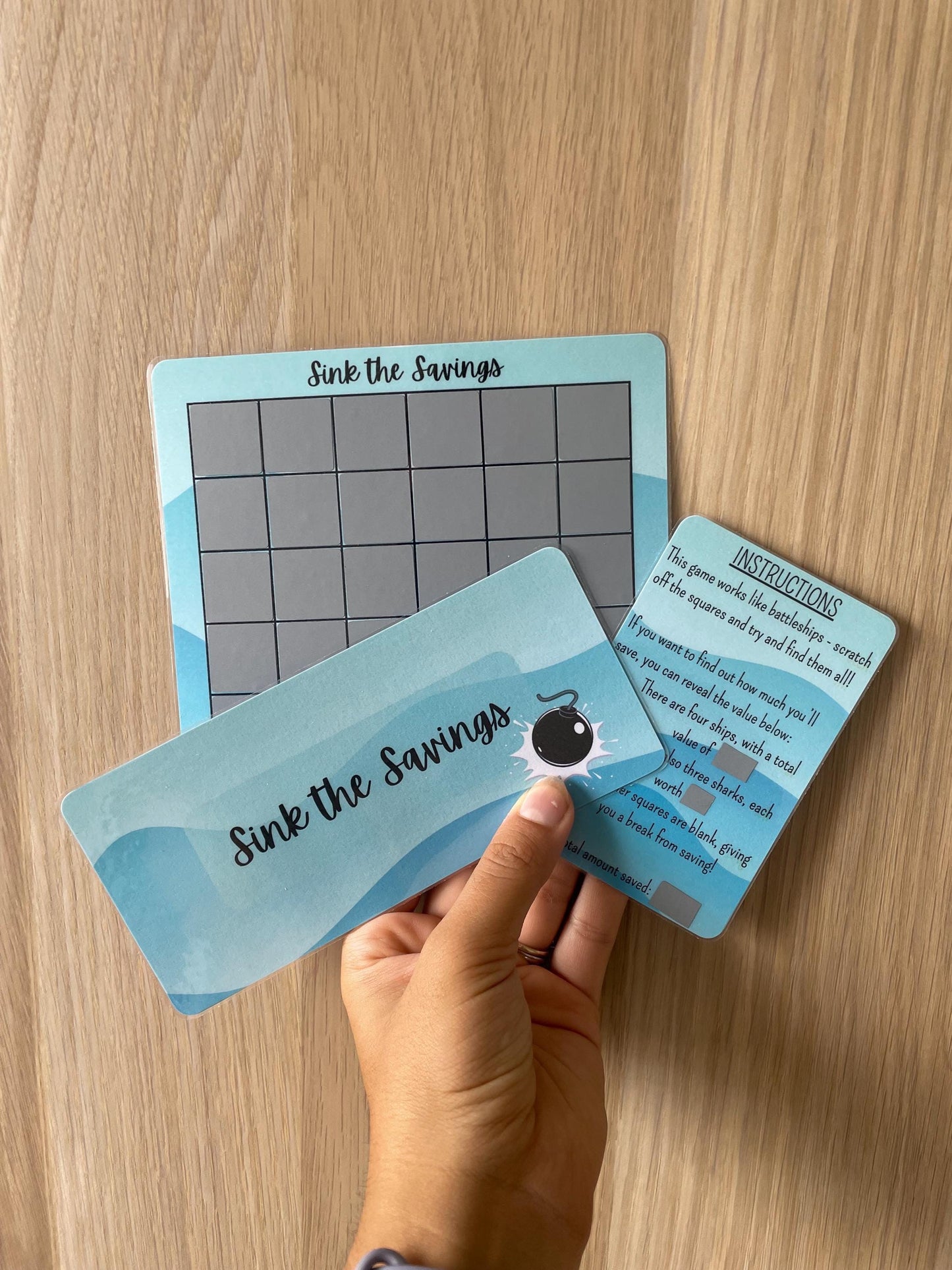 Sink Your Savings Scratch Off Game